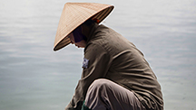 Vietnamese pearl farm employee at Hạ Long Bay