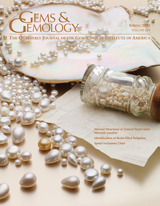 The internal structures of natural pearls from the marine mollusk Pinctada maxima are the subject of the lead article in this issue. The scattered loose pearls on the cover are from Paspaley’s natural pearl collection, which includes one discovered in the 1970s at the Eighty Mile Beach fishing grounds